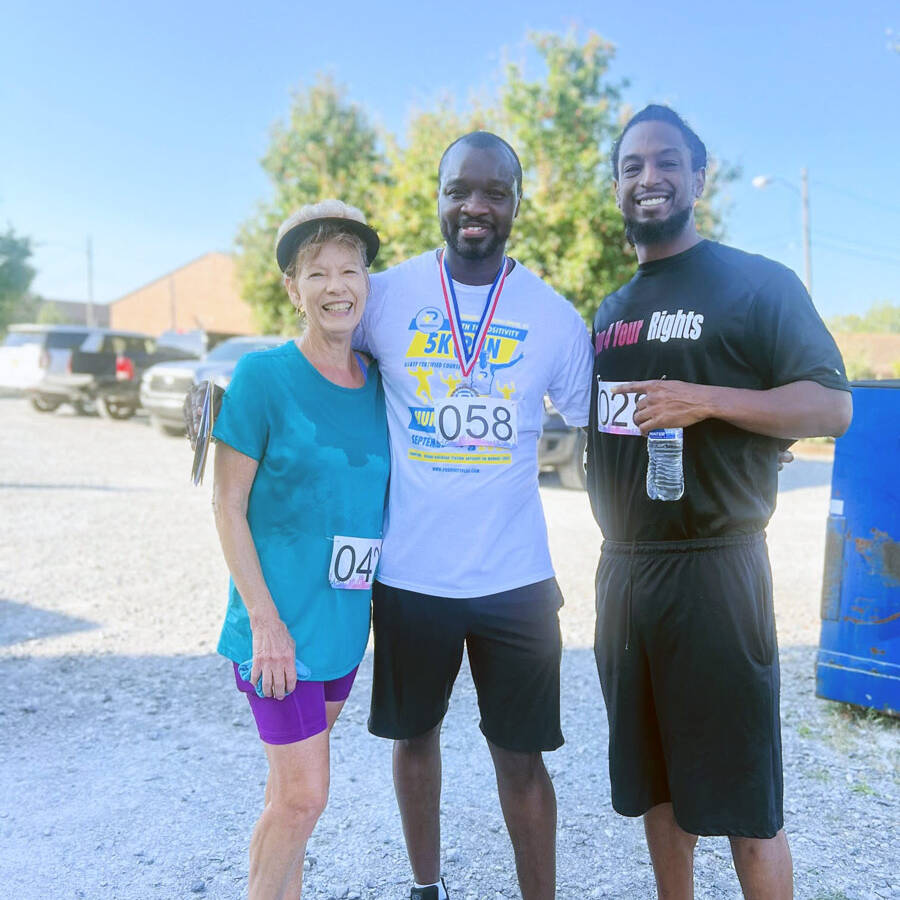 Runners posing for photo at Path to Positivity 5K Run